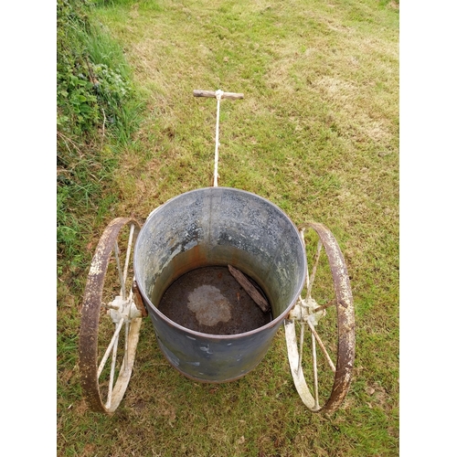 92 - 19th C. wrought iron gardeners water barrel {76 cm H x 79 cm W x 166 cm D}.