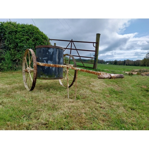 92 - 19th C. wrought iron gardeners water barrel {76 cm H x 79 cm W x 166 cm D}.