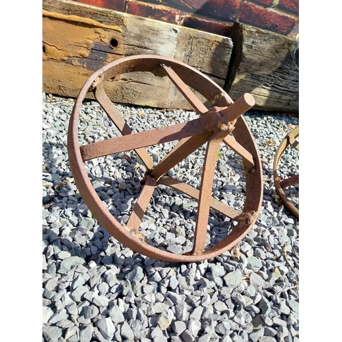 922 - Pair of cast iron wheel barrow wheels {33 cm W x 34 cm Dia.}.