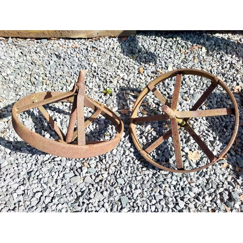 922 - Pair of cast iron wheel barrow wheels {33 cm W x 34 cm Dia.}.