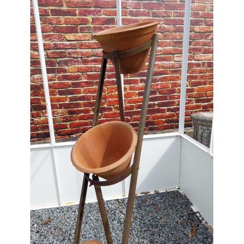 926 - Early 20th C. four tiered wrought iron pot rack with terracotta plant pots {120 cm H x 46 cm W x 40 ... 