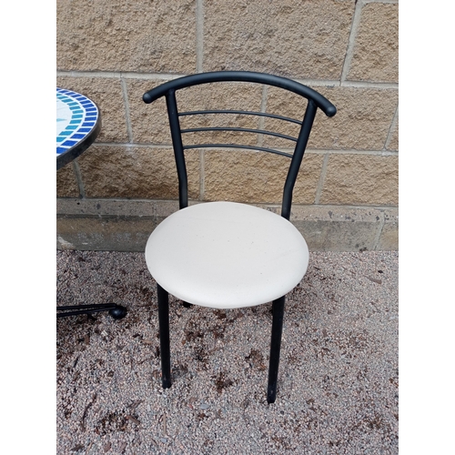 934 - Cast iron table mosaic top and two metal chairs with leather seats {Table H 72cm x Dia 70cm Chairs H... 