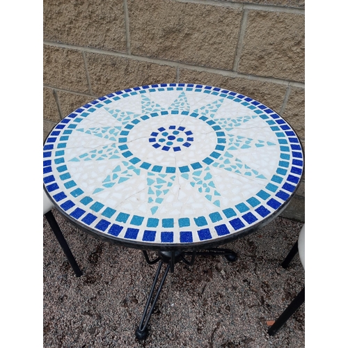 934 - Cast iron table mosaic top and two metal chairs with leather seats {Table H 72cm x Dia 70cm Chairs H... 