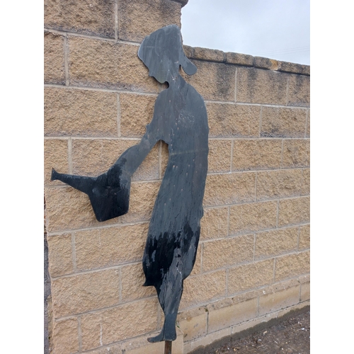 935 - Metal silhouette of lady with watering can {H 209cm x W 80cm }. (NOT AVAILABLE TO VIEW IN PERSON)