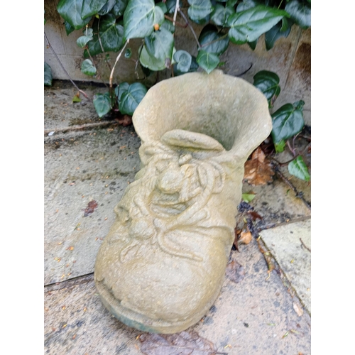 937 - Composition stone planter in the form of a boot  {H 21cm x W 24cm x D 46cm }. (NOT AVAILABLE TO VIEW... 