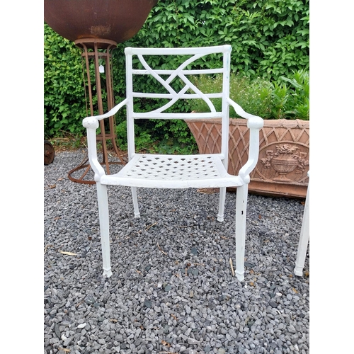 943 - Pair of cast aluminium garden chairs {84 cm H x 58 cm W x 45 cm D}.