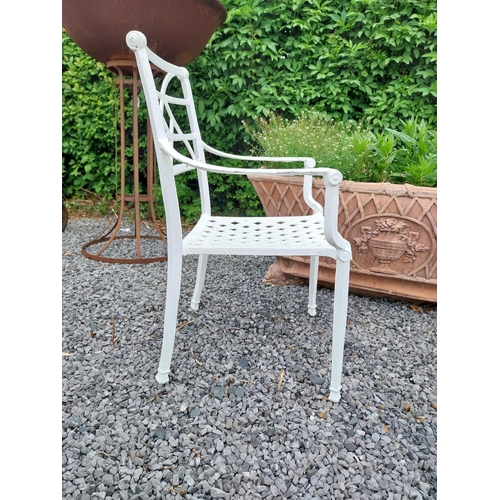 943 - Pair of cast aluminium garden chairs {84 cm H x 58 cm W x 45 cm D}.