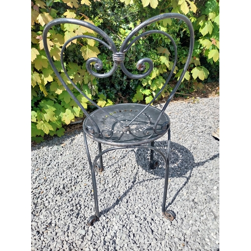 951 - Wrought iron garden table with three matching chairs {Tbl. 65 cm H x 65 cm Dia. and Chairs 82 cm H x... 