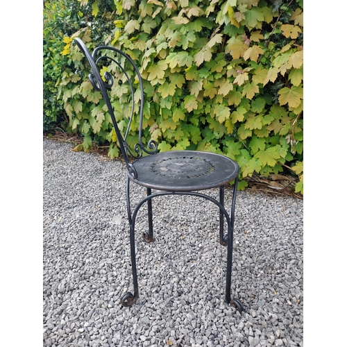 951 - Wrought iron garden table with three matching chairs {Tbl. 65 cm H x 65 cm Dia. and Chairs 82 cm H x... 