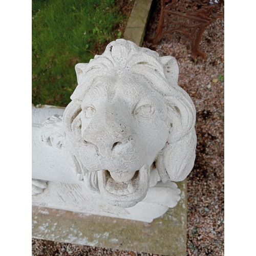 967 - Pair of composition stone statues of Lions with ball at feet {H 110cm x D 120cm x W 40cm}. (NOT AVAI... 