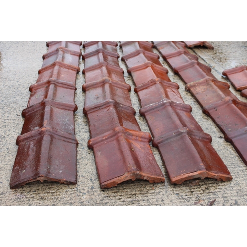 97 - Collection of ninety salt glazed roof tiles includes five corners {H 35cm x W 32cm x D 10cm}. (NOT A... 