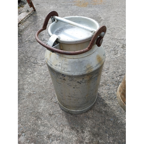 978 - Pair of aluminium creamery cans {57 cm H x 30 cm Dia.}.