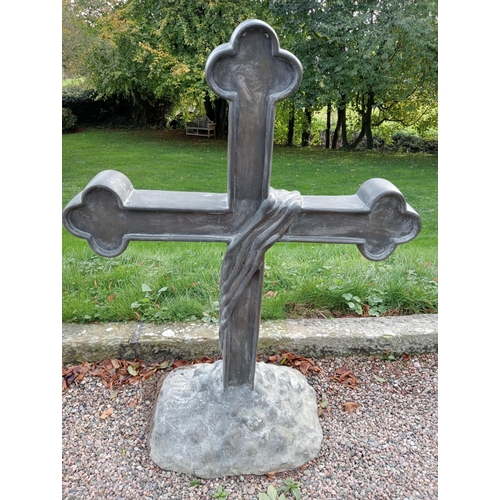 987 - Bronze cross mounted on stone base {H 125cm x W 90cm x D 40cm }. (NOT AVAILABLE TO VIEW IN PERSON)