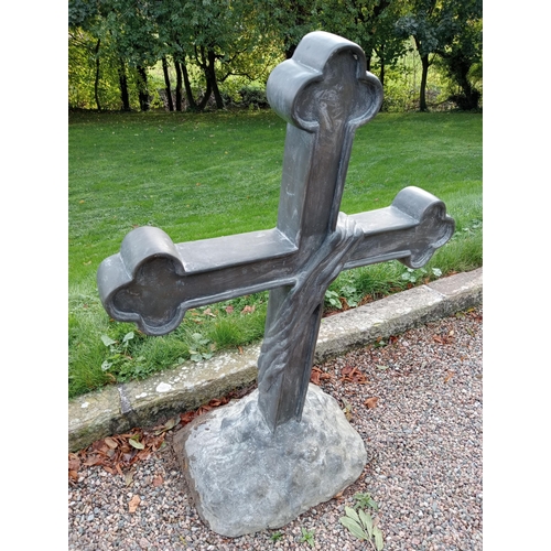 987 - Bronze cross mounted on stone base {H 125cm x W 90cm x D 40cm }. (NOT AVAILABLE TO VIEW IN PERSON)