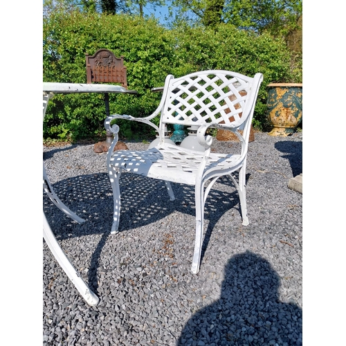 988 - Cast aluminium garden table with two matching armchairs {Tbl. 76 cm H x 160 cm Dia. and Chairs 81 cm... 