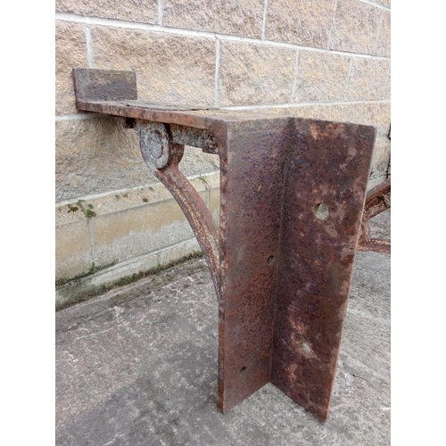 989 - Pair of large heavy cast iron brackets {H 60cm x W 16cm x D 72cm }. (NOT AVAILABLE TO VIEW IN PERSON... 