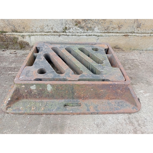 995 - Three cast iron manholes {H 10cm x W 54cm x D 44cm }. (NOT AVAILABLE TO VIEW IN PERSON)