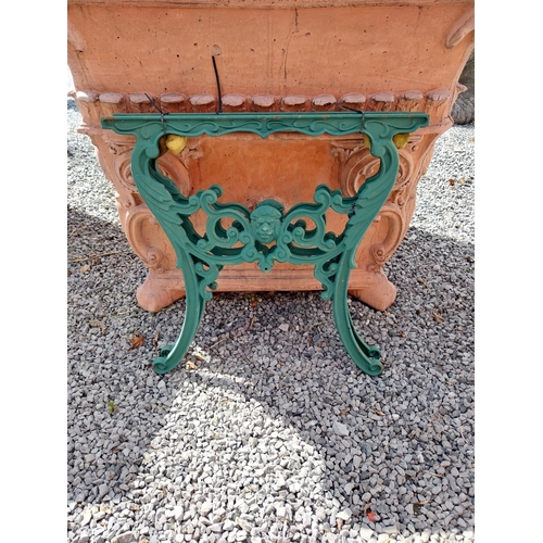 996 - Pair of cast iron seat ends {65 cm H x 68 cm W x 5 cm D}.