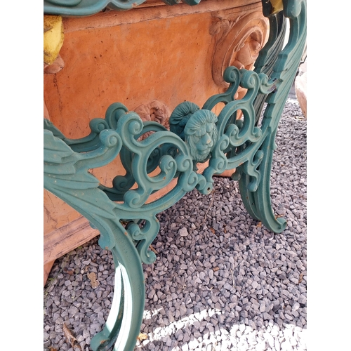 996 - Pair of cast iron seat ends {65 cm H x 68 cm W x 5 cm D}.