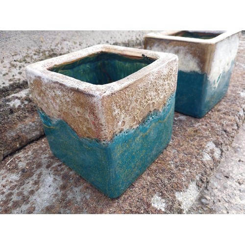 12 - Pair of Atlantis glazed terracotta plant pots {16 cm H x 16 cm W x 16 cm D}.