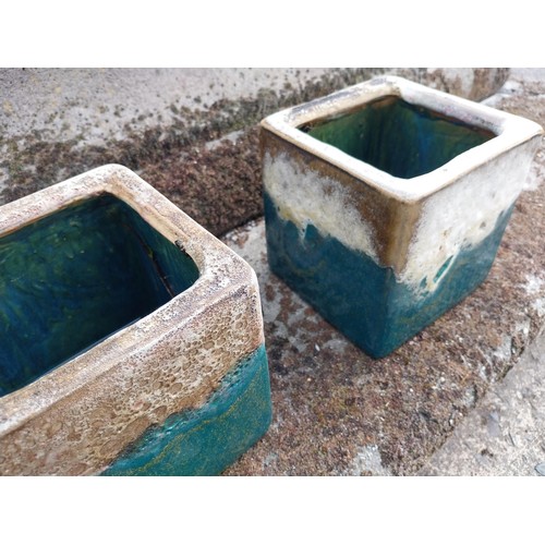 12 - Pair of Atlantis glazed terracotta plant pots {16 cm H x 16 cm W x 16 cm D}.