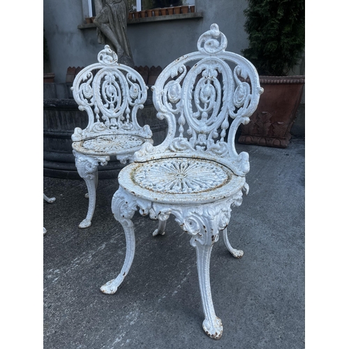 106 - Set of four 19th C. cast iron garden chairs {80cm H x 40cm W x 50cm D}