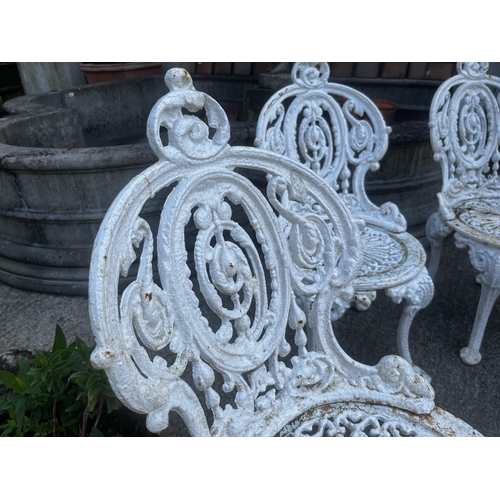 106 - Set of four 19th C. cast iron garden chairs {80cm H x 40cm W x 50cm D}