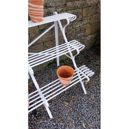 6a - Good quality wrought iron three tier plant stand {75cm H x 116cm W x 60cm D}