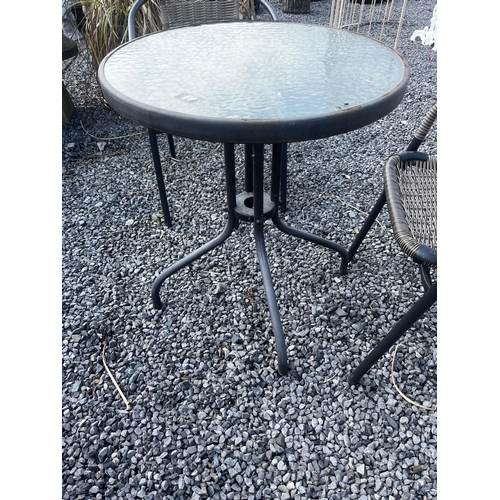 801 - Garden table and two rattan chairs {Table:70cm H x 60cm Dia. And Chairs: 76cm H x 54cm W x 56cm D}