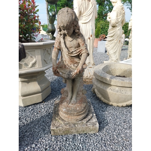 116 - Moulded stone statue of a girl {90cm H x 36cm W x 38cm D}