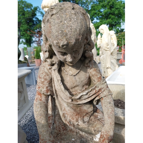 116 - Moulded stone statue of a girl {90cm H x 36cm W x 38cm D}