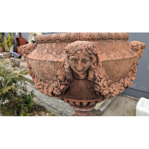 208 - Pair of exceptional quality English moulded terracotta urns decorated with floral swags and ladies m... 