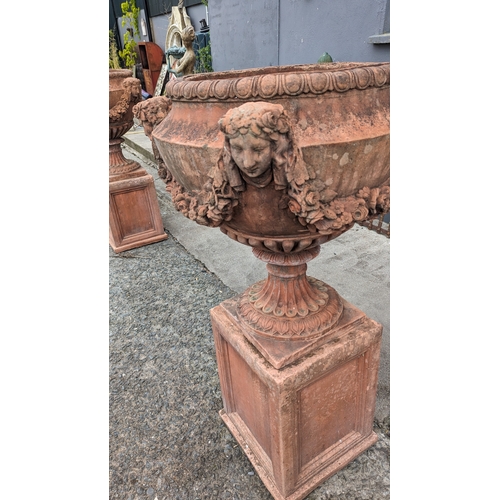 208 - Pair of exceptional quality English moulded terracotta urns decorated with floral swags and ladies m... 