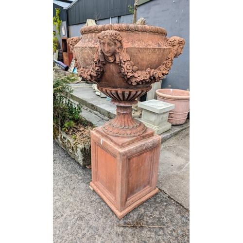 208 - Pair of exceptional quality English moulded terracotta urns decorated with floral swags and ladies m... 