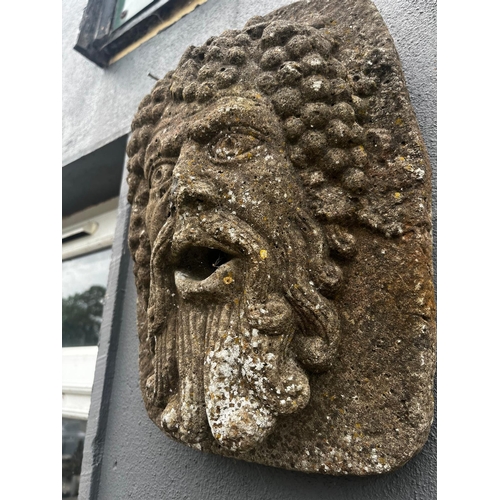 892 - Pair of early 20th C. moulded stone wall masks