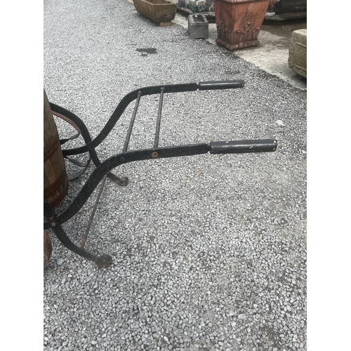 1031 - Early 20th C. metal bound oak water cart on cast iron wheels.