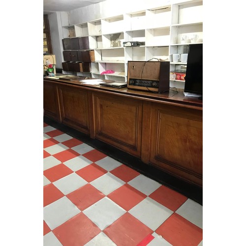 450 - Early 20th C. mahogany and pine bar counter with five inset panels {100 cm H x 520 cm L x 65 cm D}.