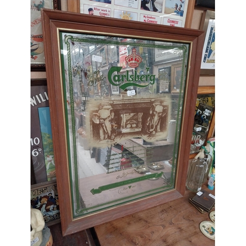 1 - Framed Carlsberg advertising mirror.{91 cm H x 71 cm W}.