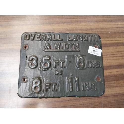 1051 - Overall Length and Width cast iron ridge plate. {18 cm H x 23 cm W}.