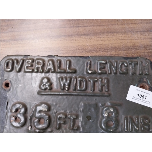 1051 - Overall Length and Width cast iron ridge plate. {18 cm H x 23 cm W}.