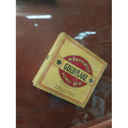 1056 - Framed montage of Gold Flake cigarettes advertising sign and boxes. {56 cm H x 47 cm W}.