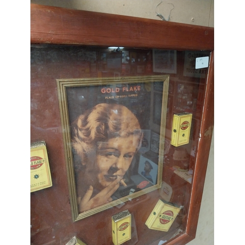 1056 - Framed montage of Gold Flake cigarettes advertising sign and boxes. {56 cm H x 47 cm W}.