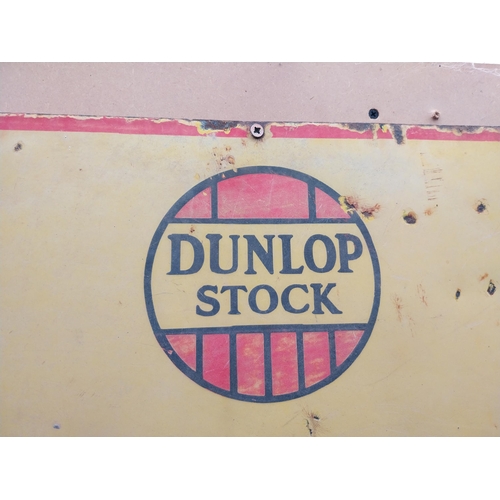 1057 - Dunlop Stock First Tyre in the World enamel advertising sign. {50 cm H x 75 cm W}.