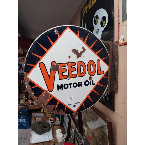 1059 - Veedol double sided enamel advertising sign. {40 cm H x 53 cm Dia.}.