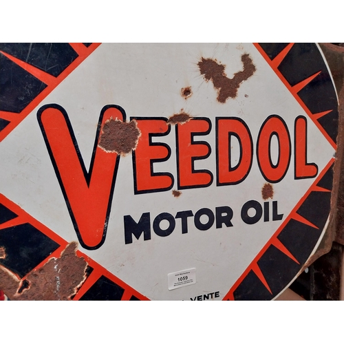 1059 - Veedol double sided enamel advertising sign. {40 cm H x 53 cm Dia.}.