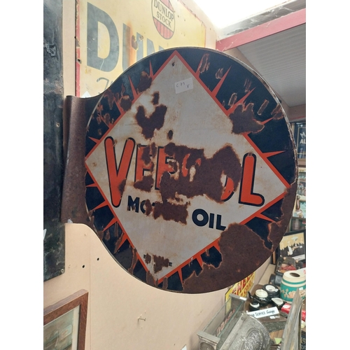 1059 - Veedol double sided enamel advertising sign. {40 cm H x 53 cm Dia.}.