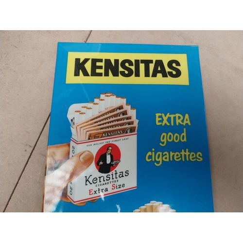 106 - Kensitas Extra Good Cigarettes celluloid counter showcard. {30 cm H x 15 cm W}.