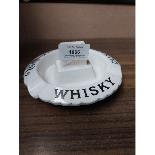 1066 - Dunville's whiskey ceramic ashtray and match strike Richard Patterson Belfast. {5 cm H x 13 cm W}.