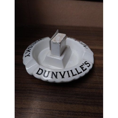 1066 - Dunville's whiskey ceramic ashtray and match strike Richard Patterson Belfast. {5 cm H x 13 cm W}.