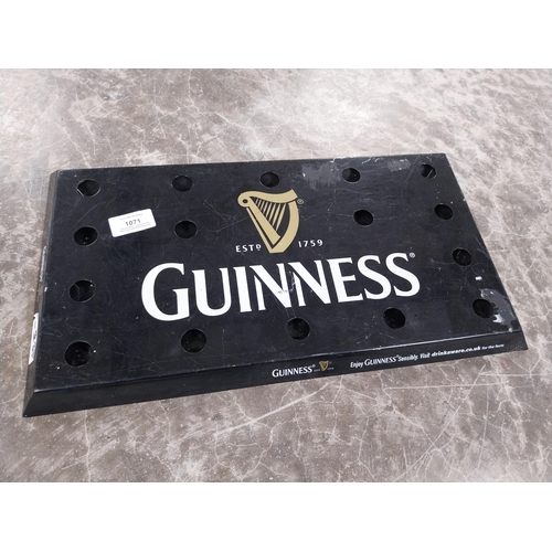 1071 - Guinness tinplate drip tray. {2 cm H x 43 cm W x 24 cm D} and Guinness Perspex Pepper Pot. {13 cm H ... 